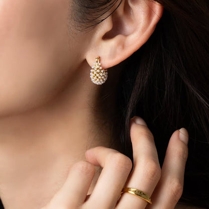 Boucles d'oreilles en nid de perles